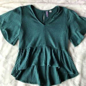 Ruffle bottom ribbed blouse